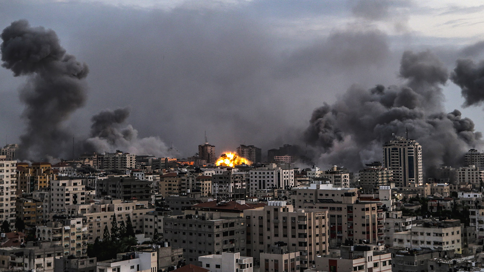 epa10910429 Smoke rises following an Israeli air strike on Gaza City, 09 October 2023. More than 700 Israelis were killed and over 2,000 were injured since the Islamist movement Hamas carried out an unprecedented attack on southern Israel on 07 October, the Israeli army said. According to Palestinian officials, more than 700 people were killed and nearly 4,000 were injured as a result of Israel’s retaliatory raids and air strikes in the Palestinian enclave. EPA/MOHAMMED SABER